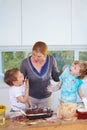 Family, baking and a mother yelling at her children for the mess in a home kitchen with naughty boys. Food, cake or Royalty Free Stock Photo