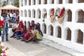 Family with a ball in a cemetery on Day of the Dead