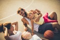Family basketball is great recreation . Portrait of Family lying