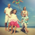 Family Beach Holiday Flying Kite Sea Togetherness Concept Royalty Free Stock Photo