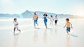 Family, beach and parents play with children for bonding, quality time and adventure by sea. Travel, running and happy Royalty Free Stock Photo