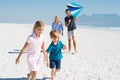 Family at beach playing Royalty Free Stock Photo