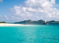 Family On Beach with Sailboat Royalty Free Stock Photo