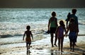 Family on Beach at Sunset Royalty Free Stock Photo