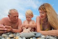 Family on beach, wide angle