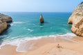 Family at beautiful beach Carvalho of Algarve, Portugal