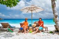 Family with three year old boy on beach. Seychelles, Mahe Royalty Free Stock Photo