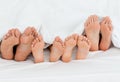 Family on the bed at home Royalty Free Stock Photo