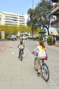 Family bike ride in the city