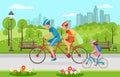 Family Bike Ride through City Park in Summer. Royalty Free Stock Photo