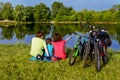 Family bike ride outdoors, active parents and kid cycling Royalty Free Stock Photo