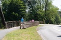 Family on bikes rear view in Lacanau lake France during vacation summer