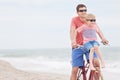 Family biking at the beach Royalty Free Stock Photo