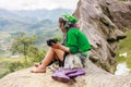 A family of the Black H'mong Ethnic Minority People sit on hill in Sapa, Vietnam on September 14, 2016 Royalty Free Stock Photo