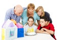 Family Blows Out Birthday Candles Royalty Free Stock Photo