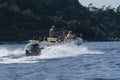 family boat trip sailing into mediterranean sea near to sicily coast