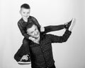 Family bonding. childhood. parenting. happy family. father and son in red checkered shirt. fathers day. little boy with Royalty Free Stock Photo