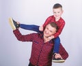 Family bonding. childhood. parenting. happy family. father and son in red checkered shirt. fathers day. little boy with Royalty Free Stock Photo