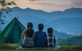 Family Bonding in Wilderness: Pitching a Tent at Sunset