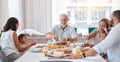 Family, breakfast and food with a senior man eating during a visit from his children and grandchildren at home. Kids Royalty Free Stock Photo