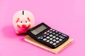 Family budget management. business start up. saving money. First salary. piggy bank with calculator. Moneybox Royalty Free Stock Photo