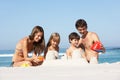 Family Building Sandcastles On Beach Holiday Royalty Free Stock Photo