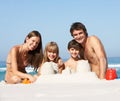 Family Building Sandcastles On Beach Holiday Royalty Free Stock Photo