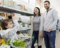 Family buying groceries in the local supermarket Royalty Free Stock Photo