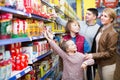 Family buying groceries in supermarket Royalty Free Stock Photo