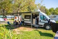 Family camping with a campervan in campsites in Greece or Croatia Royalty Free Stock Photo