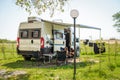 Family camping with a campervan in campsites in Greece or Croatia Royalty Free Stock Photo