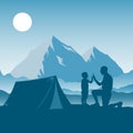 Family camping, hiking and travel. Silhouettes of father and son give five on a background of a mountain landscape. Man and Royalty Free Stock Photo