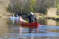 family canoeing on the river in the early morning. joint pastime, entertainment, outdoor recreation, acquaintance with Royalty Free Stock Photo