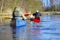 family canoeing on the river in the early morning. joint pastime, entertainment, outdoor recreation, acquaintance with