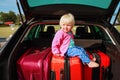 Family car travel - little baby and suitcases packed