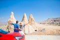 Family on car vacation. Happy couple travel by car in mountains. Royalty Free Stock Photo