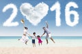 Family celebrate new year on the coast Royalty Free Stock Photo