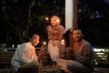 The family celebrates Eid Mubarak at night by burning fireworks