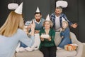 Family celebrating birthday of their grandmother and make a photo