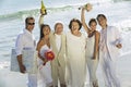 Family celebrating wedding on beach Royalty Free Stock Photo