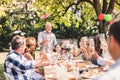 Family celebration or a garden party outside in the backyard. Royalty Free Stock Photo