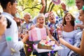 Family celebration or a garden party outside in the backyard. Royalty Free Stock Photo