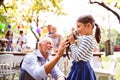 Family celebration or a garden party outside in the backyard.