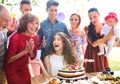 Family celebration or a garden party outside in the backyard. Royalty Free Stock Photo