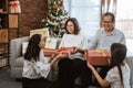 Family change christmas gift Royalty Free Stock Photo