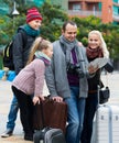 Family checking direction in map Royalty Free Stock Photo