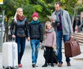 Family checking direction in map Royalty Free Stock Photo