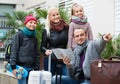 Family checking direction in map Royalty Free Stock Photo