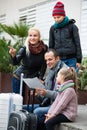 Family checking direction in map Royalty Free Stock Photo