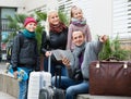 Family checking direction in map Royalty Free Stock Photo